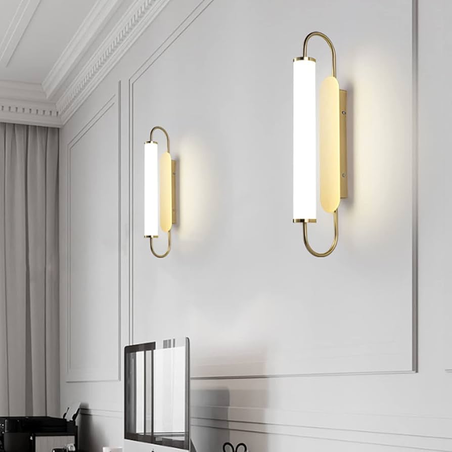Modern wall lights on a white wall with decorative molding