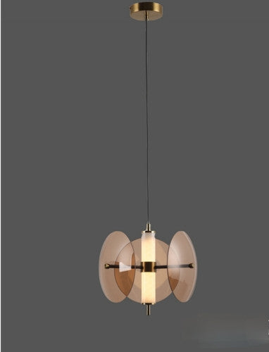 Modern pendant light with glass shades on a dark background