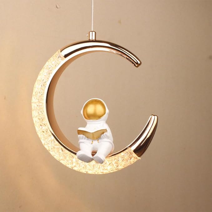 Decorative hanging lamp shaped like a moon with an astronaut figure on a beige background