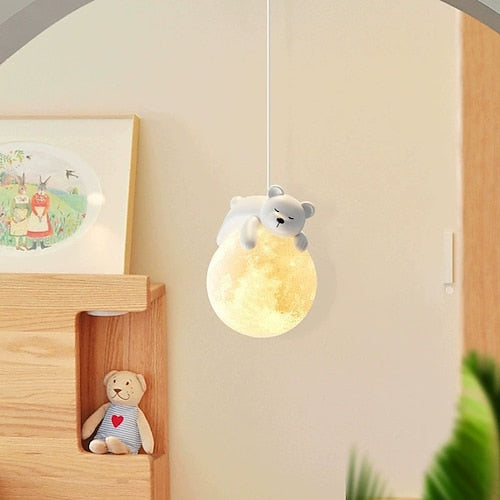 Children's room with teddy bear-themed lamp and decor