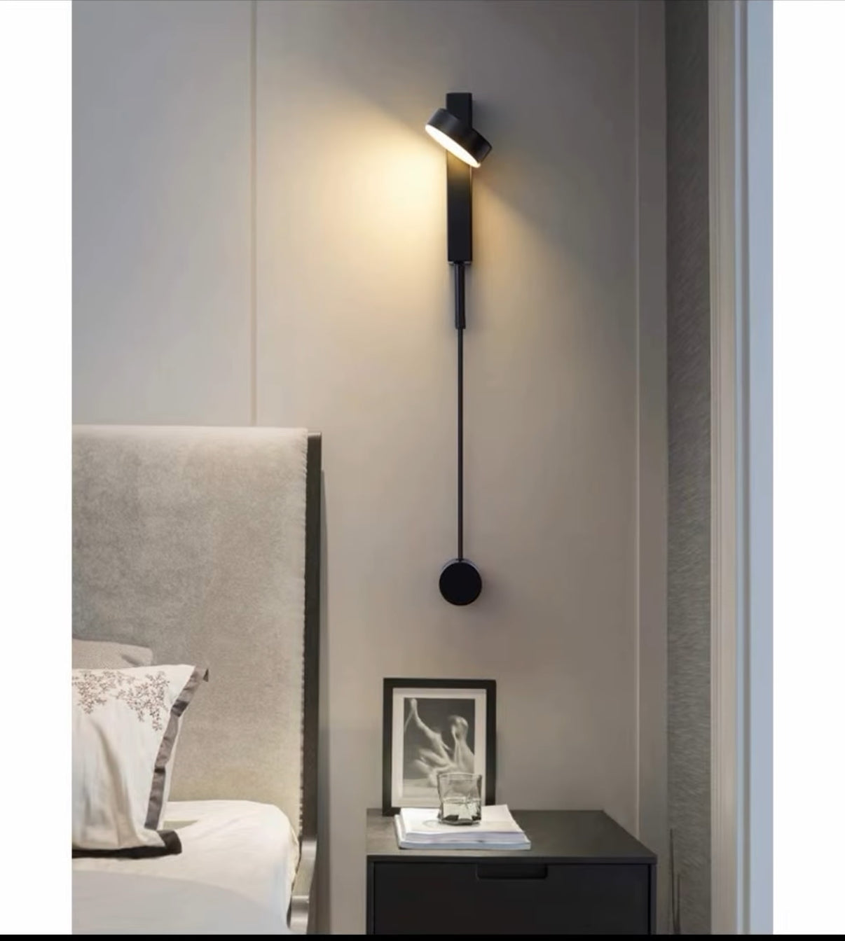 Modern wall-mounted lamp in a bedroom setting