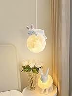 Decorative lamp with rabbit design on a white background