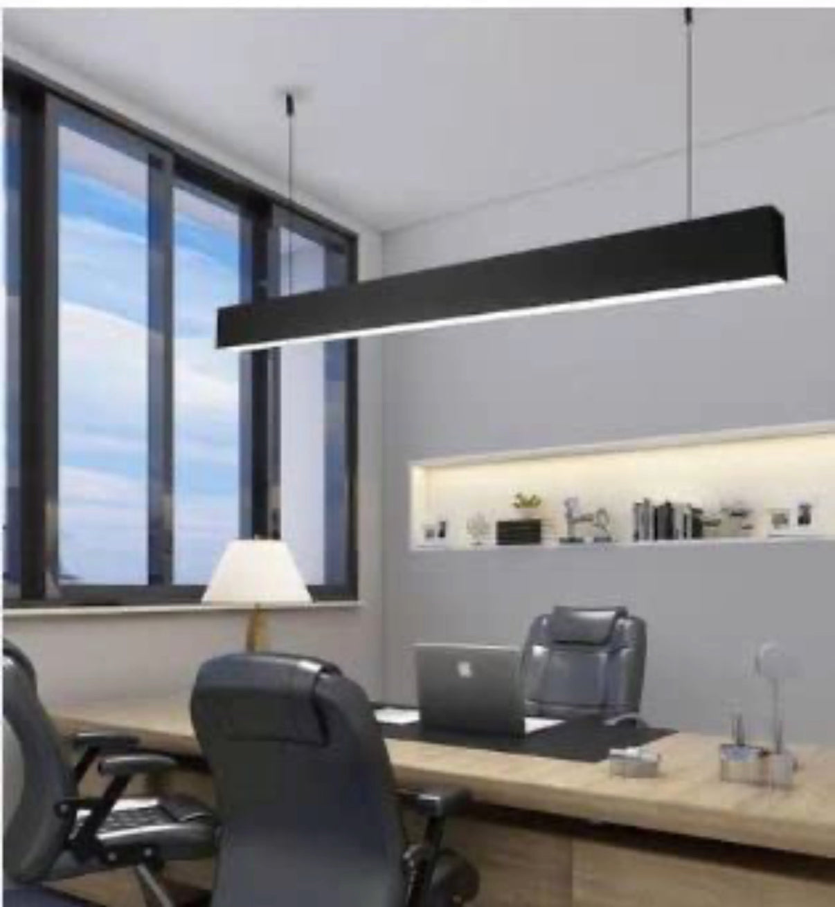 Modern office interior with a desk, chairs, and a large window.