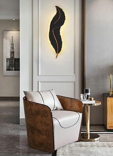 Modern interior design with a feather-shaped wall light fixture.