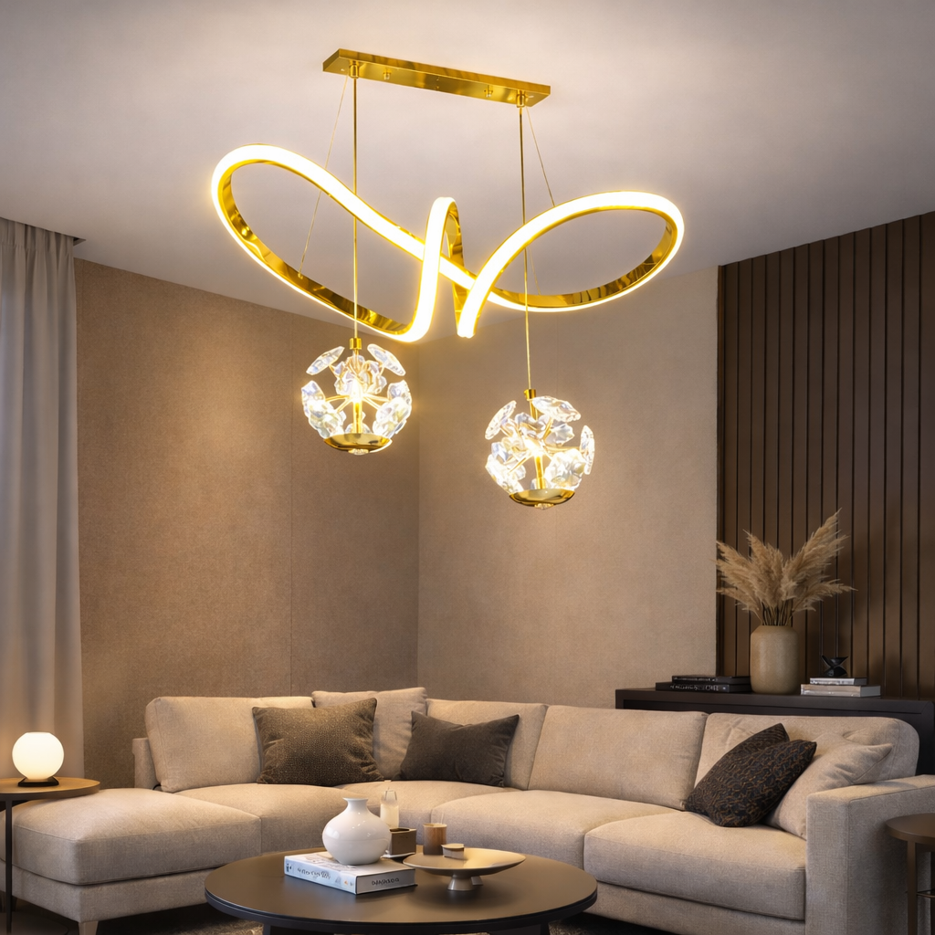 Modern living room with a gold pendant light fixture above a beige sectional sofa.