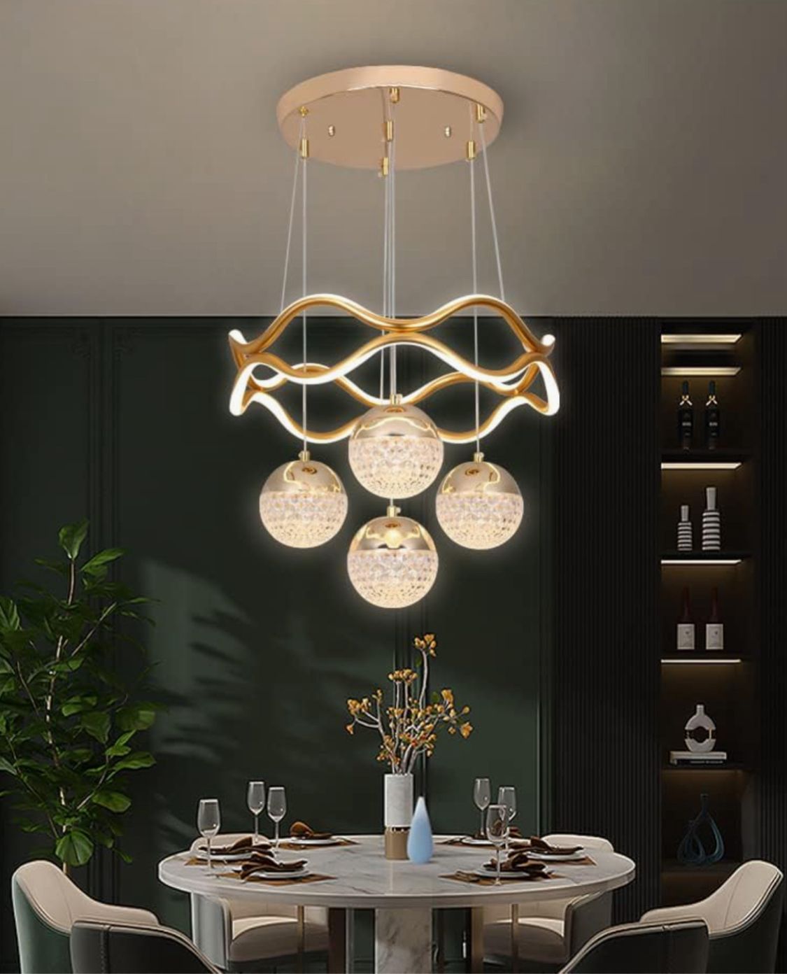 Modern dining room with a gold pendant light fixture.