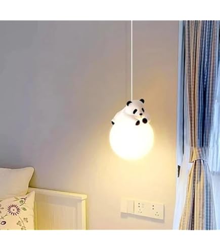 Panda-shaped pendant light in a room with a bed and window.