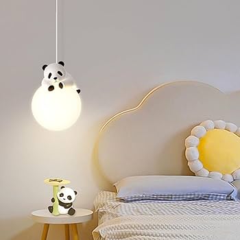 Children's room with panda-themed decor, including a lamp, toy, and headboard.