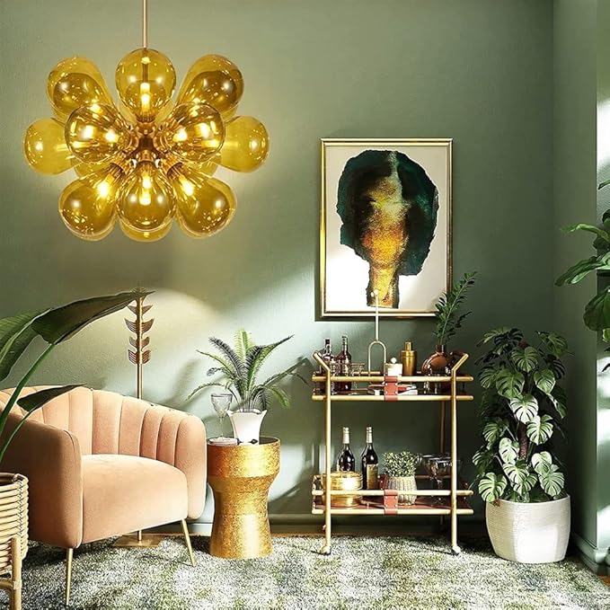 Modern living room with gold chandelier, pink armchair, and decorative plants.