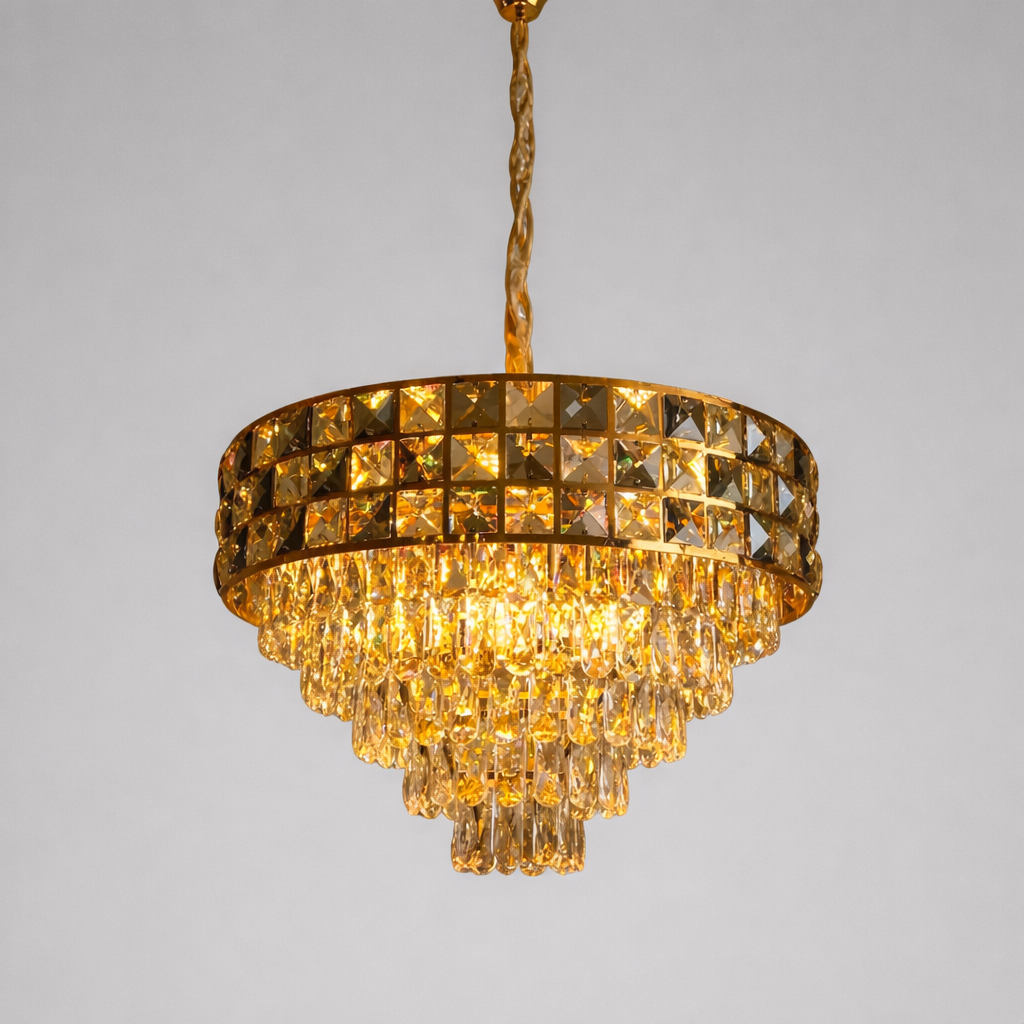 Gold chandelier with crystal details on a gray background